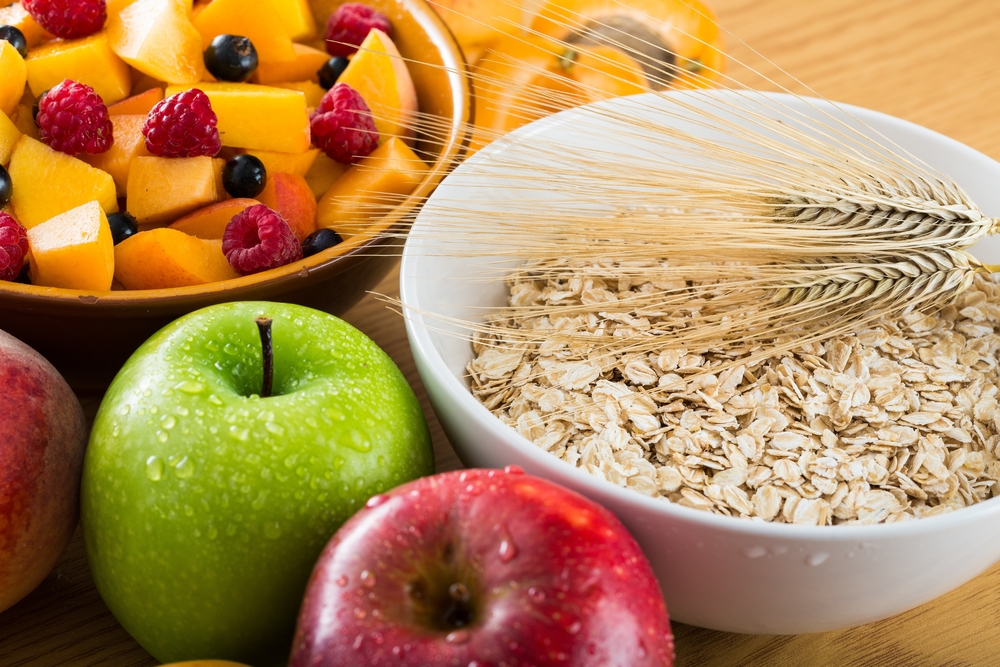 fiber-rich foods, including apples, oats, and berries