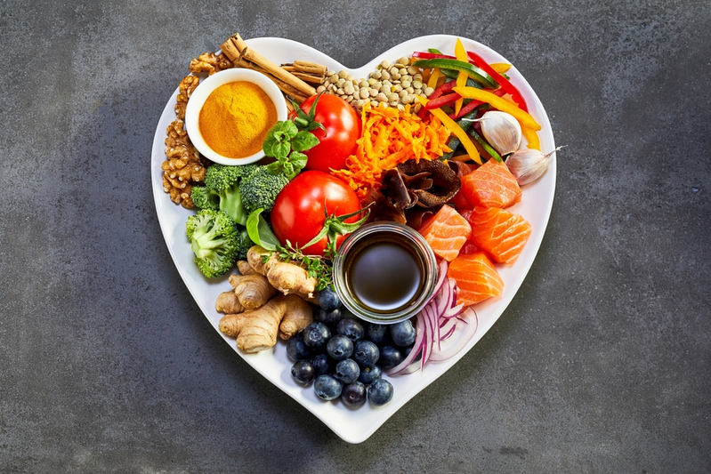 heart-shaped plate filled with heart-healthy fods